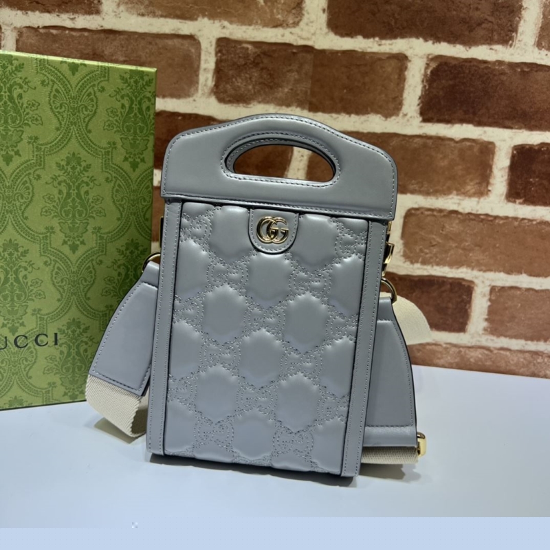 G*u*i top handle bags
